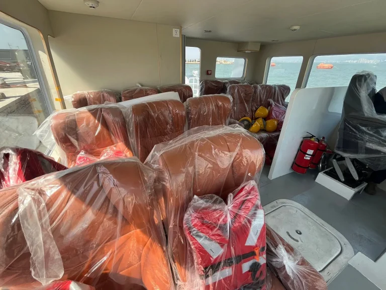 Wrapped passenger seats and life jackets in a cabin