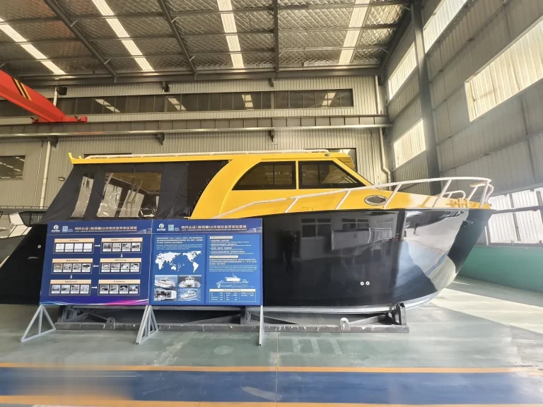 Yellow and grey plate aluminium work boat in the factory