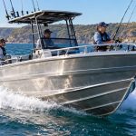 Double chine aluminium fishing boat travelling through Australian coastal water