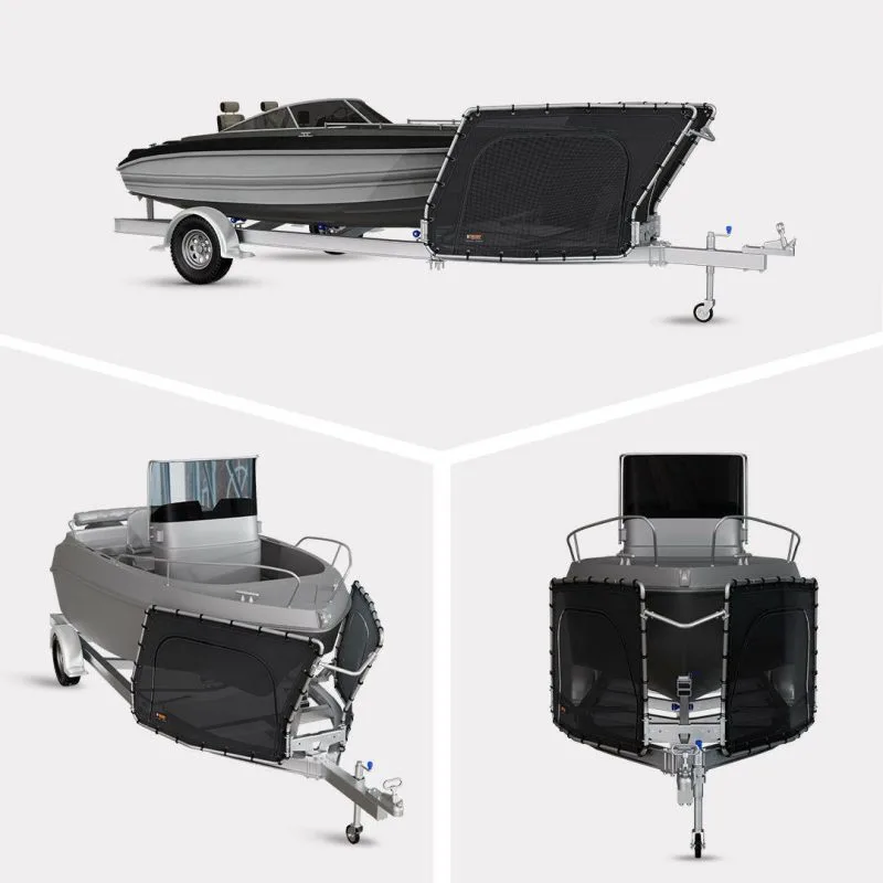 D-Flector stone guard fitted to a boat trailer, shown from the side, rear quarter and bow of a trailered runabout